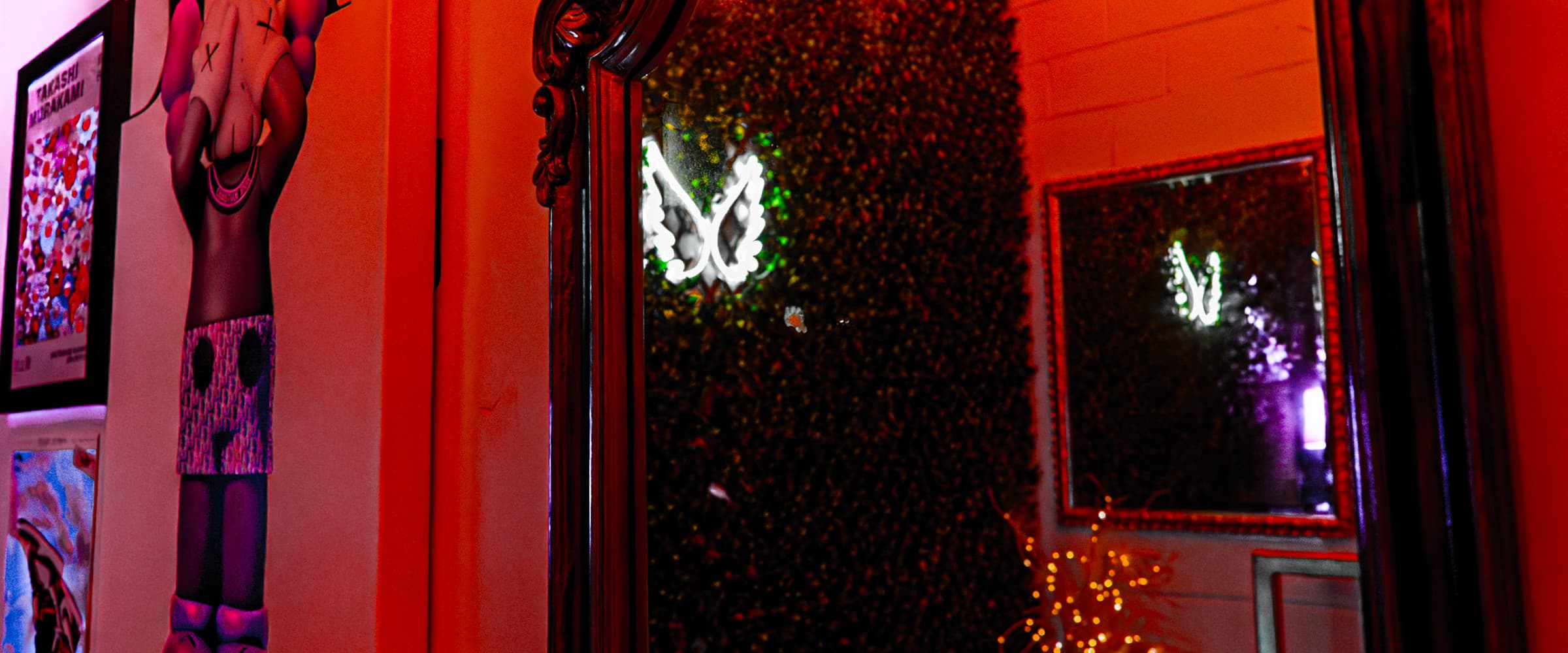 777 Lobby mirror wall with ambient red wash