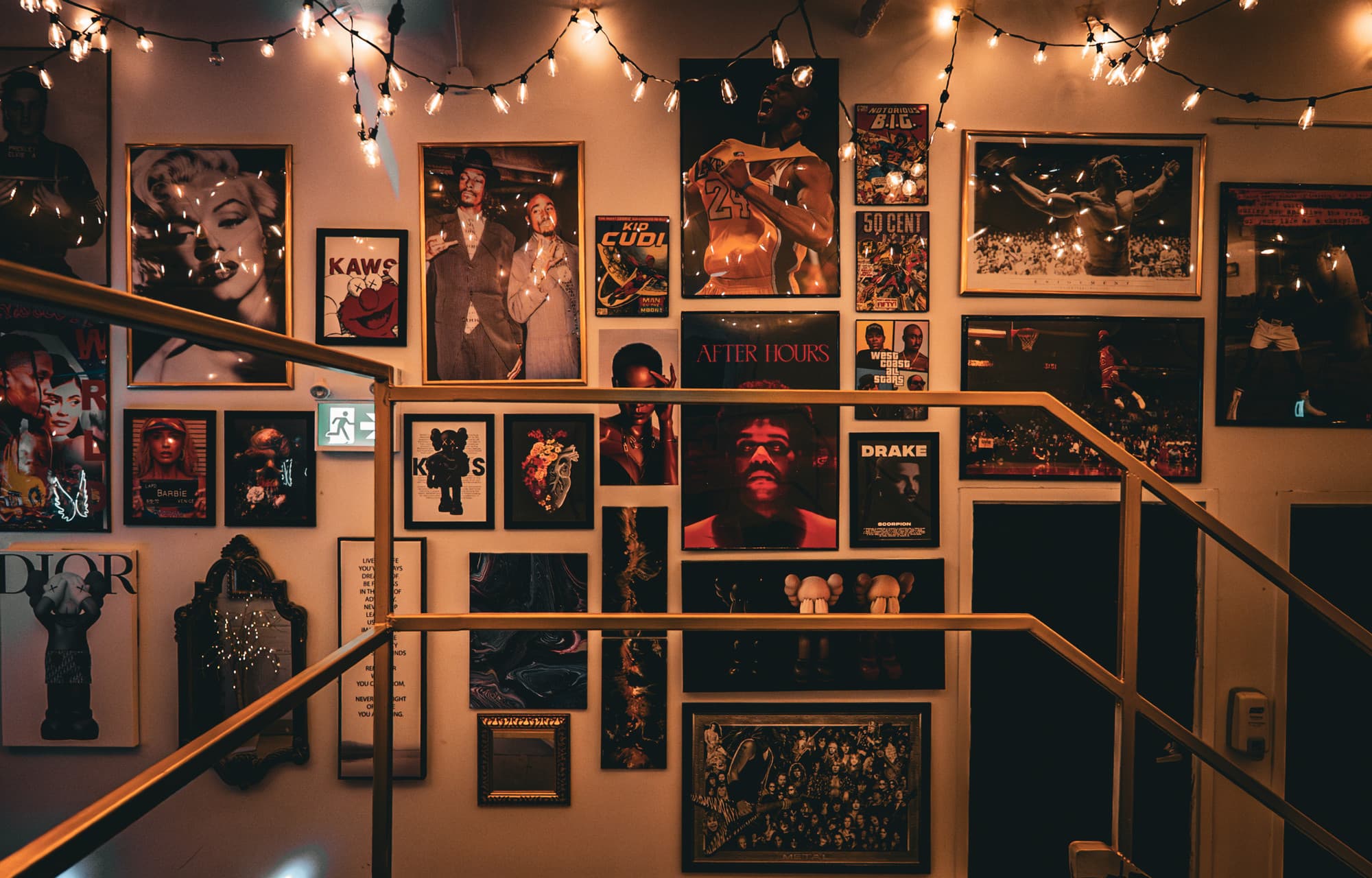 The 777 Lobby at Club Angel — gallery wall of legendary icons